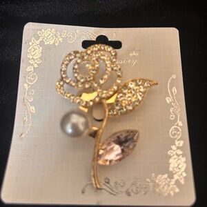 Elegant Rose Brooch with pink rhinestone pedal (gold tone)